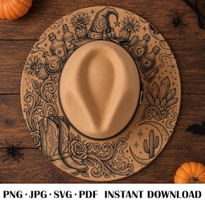May include: A tan felt hat featuring a black ink illustration on the brim. The design includes a witch hat, potion bottles, sunflowers, cowboy boots, crystals, a crescent moon, and a cactus surrounded by intricate swirling filigree patterns.