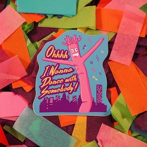 May include: A blue and pink sticker with a cartoon inflatable tube man. The tube man is pink and has a happy face. The text on the sticker says "Ohhhhh I Wanna Dance with Somebody!"
