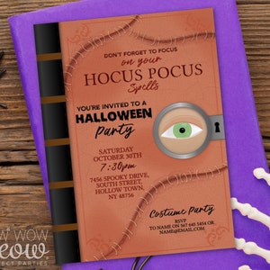 May include: Halloween party invitation designed as a spell book. The orange cover features the text "Hocus Pocus Spells" and "Halloween Party". The invitation includes the date, time, and location. A magnifying glass reveals a green eye.