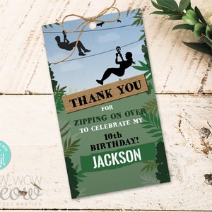 Puede incluir: Etiqueta de agradecimiento verde y marrón con una silueta de dos personas haciendo tirolina. La etiqueta dice "Gracias por venir en tirolina para celebrar mi 10º cumpleaños! Jackson".