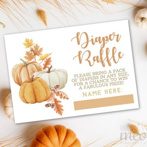 May include: A white card with the text "Diaper Raffle" in gold script, featuring watercolor pumpkins and fall leaves. The card includes instructions and a space to write a name. The bottom right corner has the text "Wow Wow Meow Purr-fect Parties."