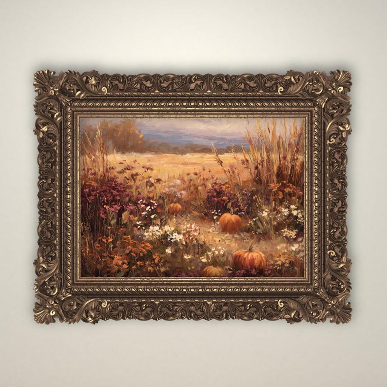 May include: An ornate, rectangular framed painting depicting a fall landscape. The artwork features a field of wheat, pumpkins, and wildflowers in shades of orange, yellow, and purple. The frame is a dark, ornate gold color.