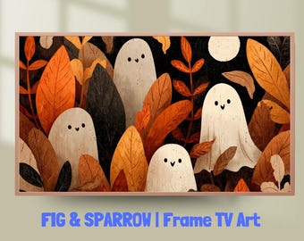 May include: A framed digital art print featuring a whimsical scene of friendly ghosts among autumn leaves. The artwork has a warm color palette of orange, brown, and black, with a full moon in the background. The text "FIG & SPARROW | Frame TV Art" is at the bottom.
