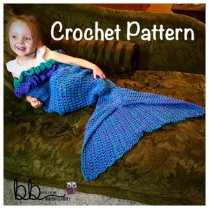 May include: A child wearing a teal, purple, and white crocheted mermaid tail blanket. The blanket has a ruffled edge and is laying on a brown couch. The text "Crochet Pattern" is written above the child.