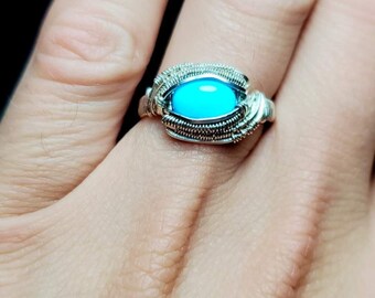 Wire Wrapped Ring: Sleeping Beauty Mine Turquoise. Size 9 1/2. Wrapped in Sterling Silver