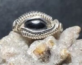 Wire Wrapped Ring: Black Onyx. Size 3 1/2. Wrapped in Sterling Silver.
