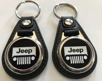 Jeep 2 pack of keychains black and white set.