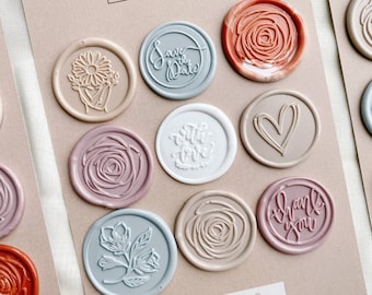 May include: A set of nine wax seals with various designs, including flowers, hearts, and calligraphy. The seals are in shades of pink, blue, brown, and orange. The text "made of HONOUR company" and "WAX SEALS" are printed on the card.