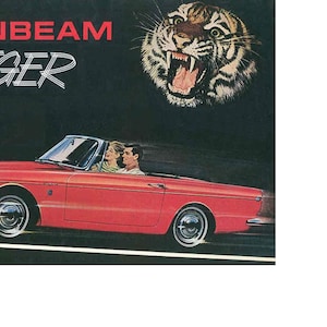 May include: A red Sunbeam Tiger convertible with a tiger illustration above the car. The car has two people in the front seats and the text "SUNBEAM TIGER" is above the car.