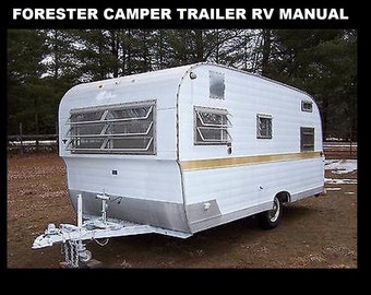 May include: A white camper trailer with a gold stripe and a screened window. The trailer has a hitch and a spare tire.