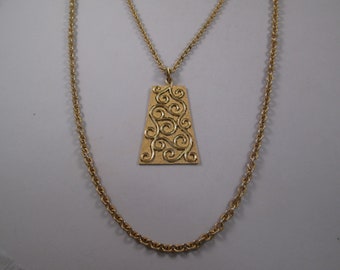 CROWN TRIFARI 1960s 1970s Pendant Necklace.  Layered Gold Chains, Large Swirling Abstract Openwork Pendant.  Statement Runway Vintage Chic.