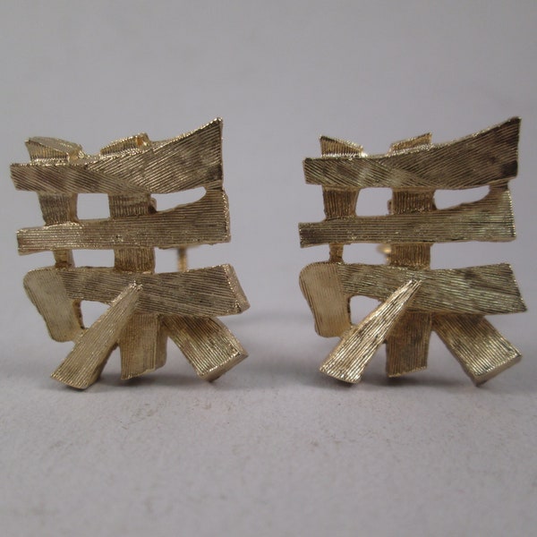 NAPIER Dynasty Collection Clip Earrings.  Chinese Characters in Textured Gold Finish.  Deep Sculptural Angular Shape. Eugene Bertolli Design