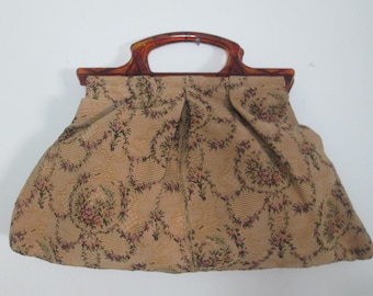 Vintage draagtas uit de jaren 1940 met tapijtmotief. Klassieke breitasstijl. Handvatten van hars. Open bovenkant. Ruim interieur. Gevonden in een nalatenschap!