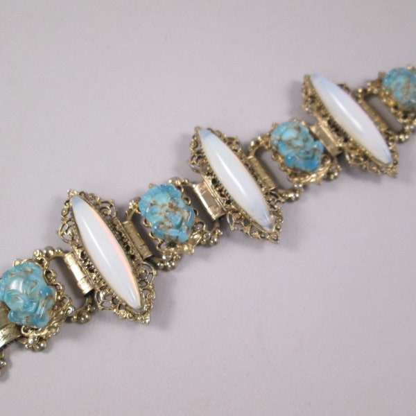 SELRO SELINI Rare Mask Bracelet.  Stunning Turquoise Glass Faces, Huge Moonstone Glass Navettes, Victorian Revival Filigree Brass.  Divine!