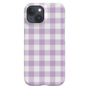 May include: A purple and white checkered phone case for an iPhone.