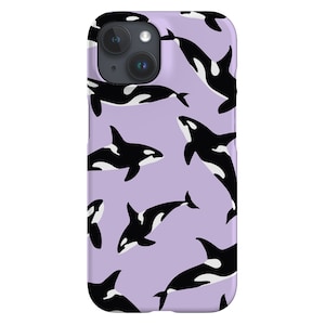 May include: A lavender phone case with a repeating pattern of black and white orca whales.