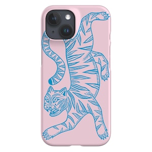 May include: A pink phone case featuring a blue tiger illustration. The tiger is depicted in a stylized, linework design, with stripes and details. The case has a smooth finish and a camera cutout.