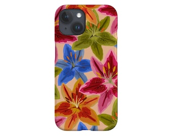 May include: A phone case with a floral design featuring lilies in shades of red, pink, blue, orange, and green on a light peach background.