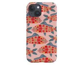 May include: A phone case featuring a repeating pattern of stylized fish. The fish are primarily red with floral designs, blue fins, and are set against a light pink background. The case has a camera cutout.