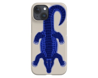 May include: A blue alligator phone case with a white background. The alligator is facing down with its tail curled up.