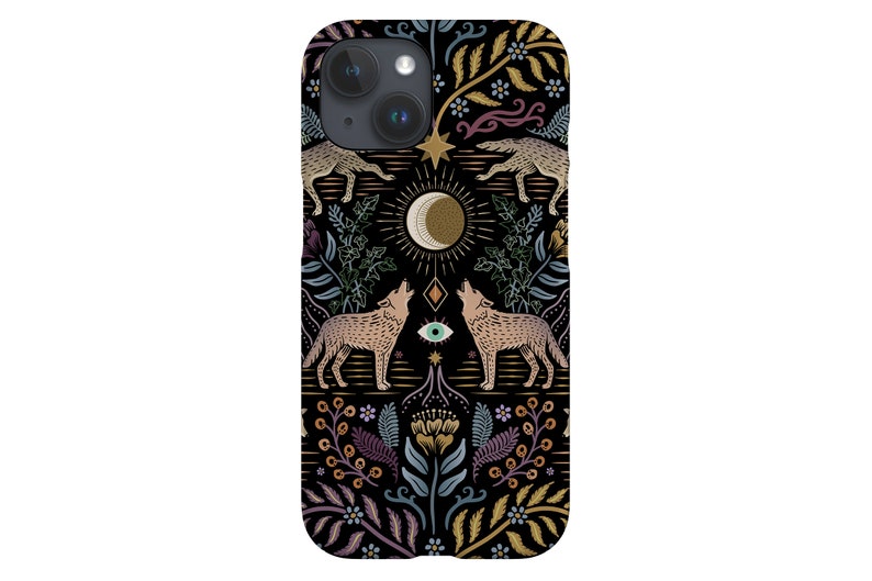 May include: A black iPhone case with a colorful floral pattern featuring wolves, a crescent moon, and a single eye. The case has a cutout for the camera lens.