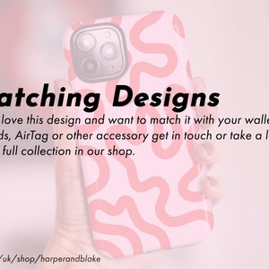 May include: A pink phone case with a wavy, abstract design in a lighter shade of pink. The text "Matching Designs" is displayed in black, along with additional text about matching accessories. The Etsy shop URL is visible.