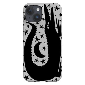 May include: A black and white phone case featuring a silhouette of a crocodile with a crescent moon and stars on a grey background.