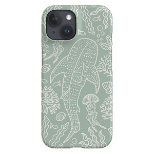 May include: A light green phone case featuring a white outline of a whale shark, coral, and jellyfish. The phone case is designed for an iPhone.
