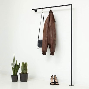 Wall Mounted Clothing Rack is produced from metal material. It is highly durable and suitable for industrial use. Suitable for Boutique Retail Display use. Metal Clothes Rack can be customized.