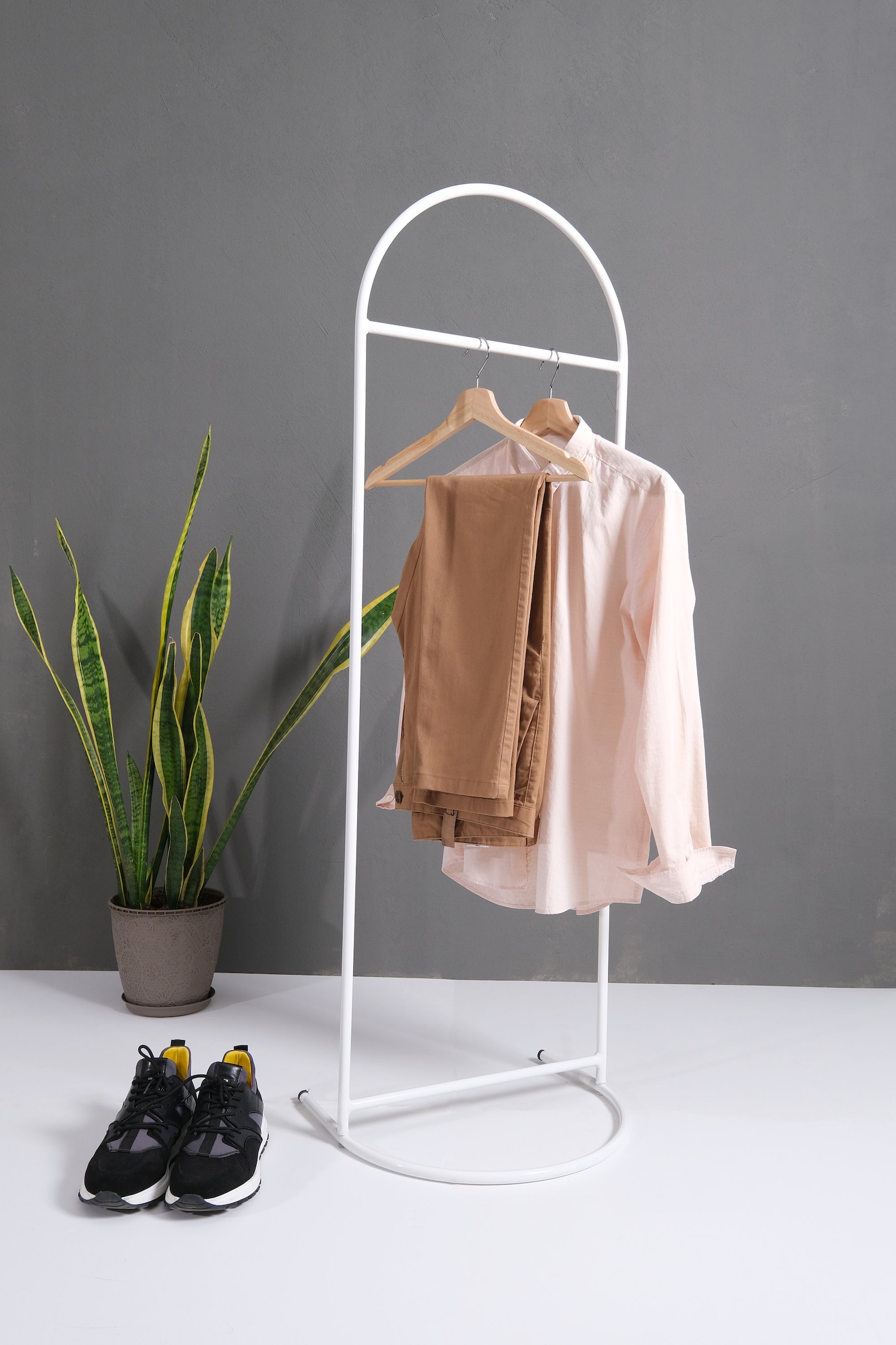 white industrial clothing rack