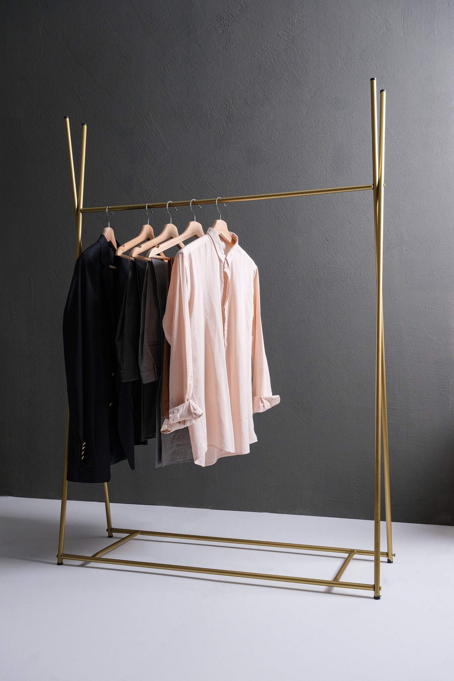 white industrial clothing rack