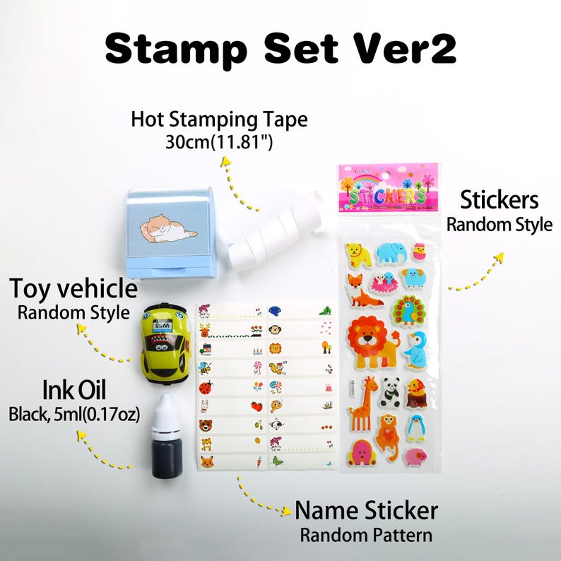 May include: A stamp set featuring a blue and white toy vehicle, a blue ink bottle, a roll of white tape, and a sheet of stickers with animal designs. The set also includes a sheet of name stickers with a random pattern. The text "Stamp Set Ver2" is at the top of the image. The text "Hot Stamping Tape 30cm(11.81")" is below the tape. The text "Stickers Random Style" is below the stickers. The text "Toy vehicle Random Style" is below the toy vehicle. The text "Ink Oil Black, 5ml(0.17oz)" is below the ink bottle. The text "Name Sticker Random Pattern" is below the name stickers.
