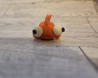 Pop eye goldfish figurine