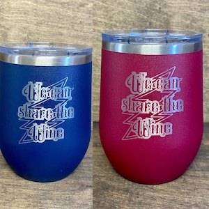 May include: Two stainless steel wine tumblers with a matte finish. The tumbler on the left is blue and the tumbler on the right is burgundy. Both tumblers have the same text: "We can share the wine" with a lightning bolt graphic.
