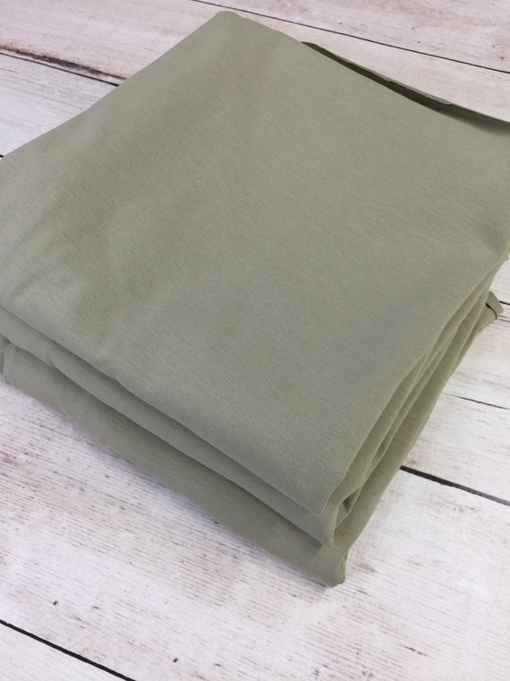 sage green swaddle