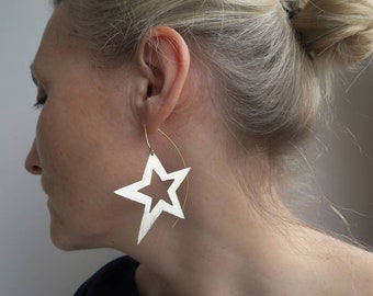 Long silver star earrings