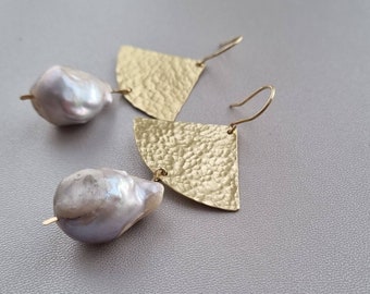 Long statement brass earrings with wild pearl