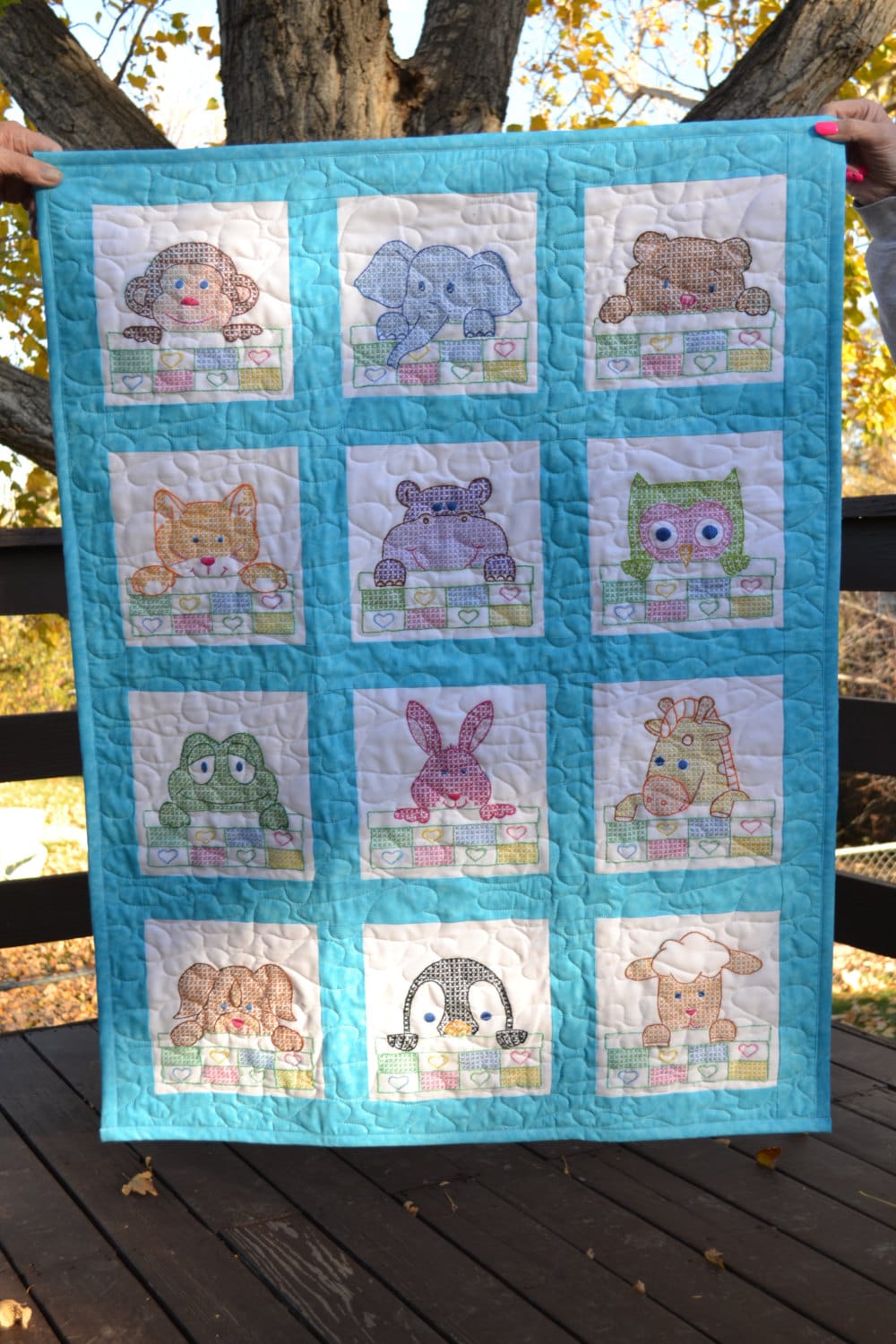 Cross stitched baby quilt featuring animals Etsy