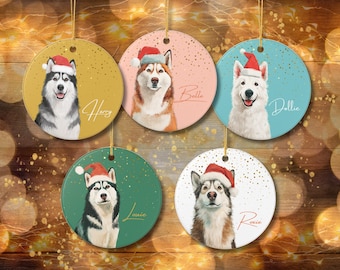 May include: Set of five round Christmas ornaments featuring portraits of dogs wearing Santa hats. Each ornament has a different background color and a dog's name: Harry, Belle, Dollie, Louie, and Roxie.