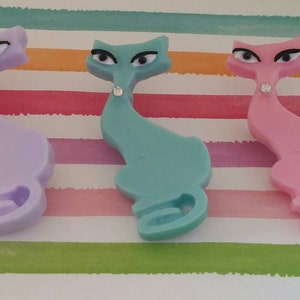 Retro kitty brooches in various colors