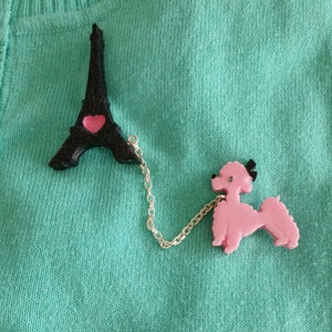 Eiffel Tower & pink French poodle brooch set.