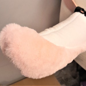 pink fluffy dog tail