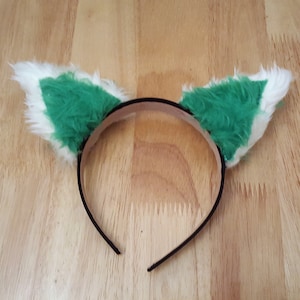 green and white cat ears