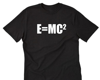 May include: Black t-shirt with the equation E=MC² printed in white. The shirt has short sleeves and a crew neck. The text is centered on the front of the shirt.