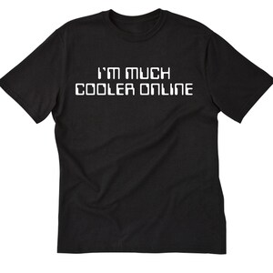 May include: Black t-shirt with white text that reads "I'm much cooler online."