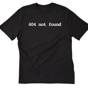 May include: Black t-shirt with white text that reads "404 not found".