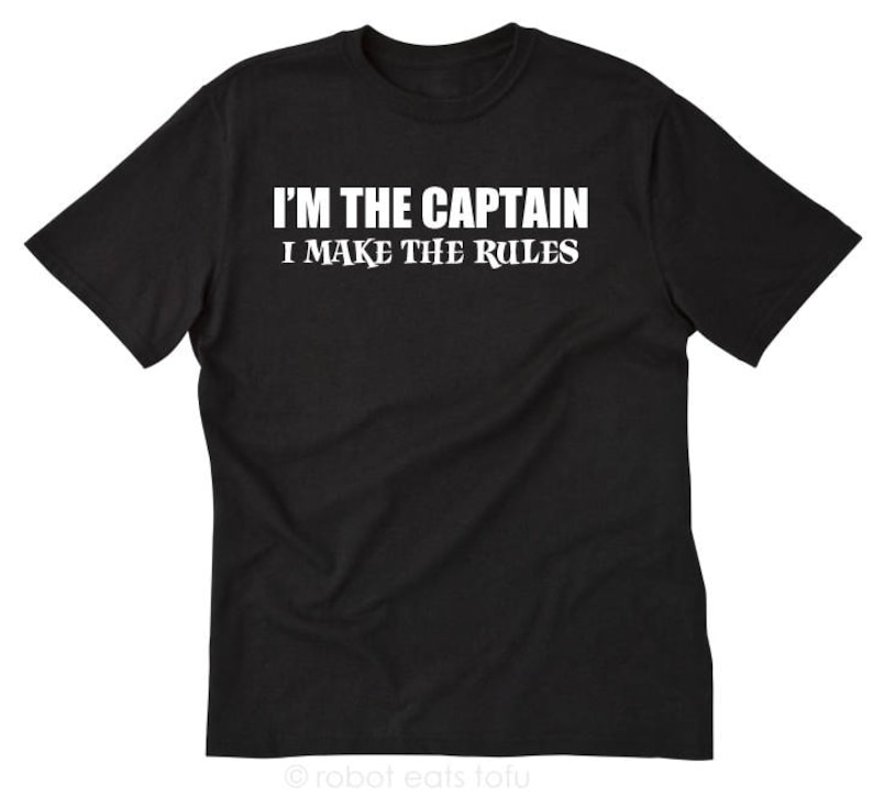 May include: Black t-shirt with white text that reads "I'm the Captain I make the rules".