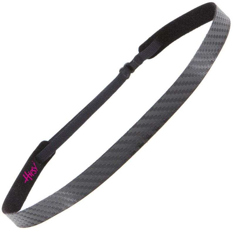 May include: Black headband with a carbon fiber pattern and a pink "Hirsy" logo.