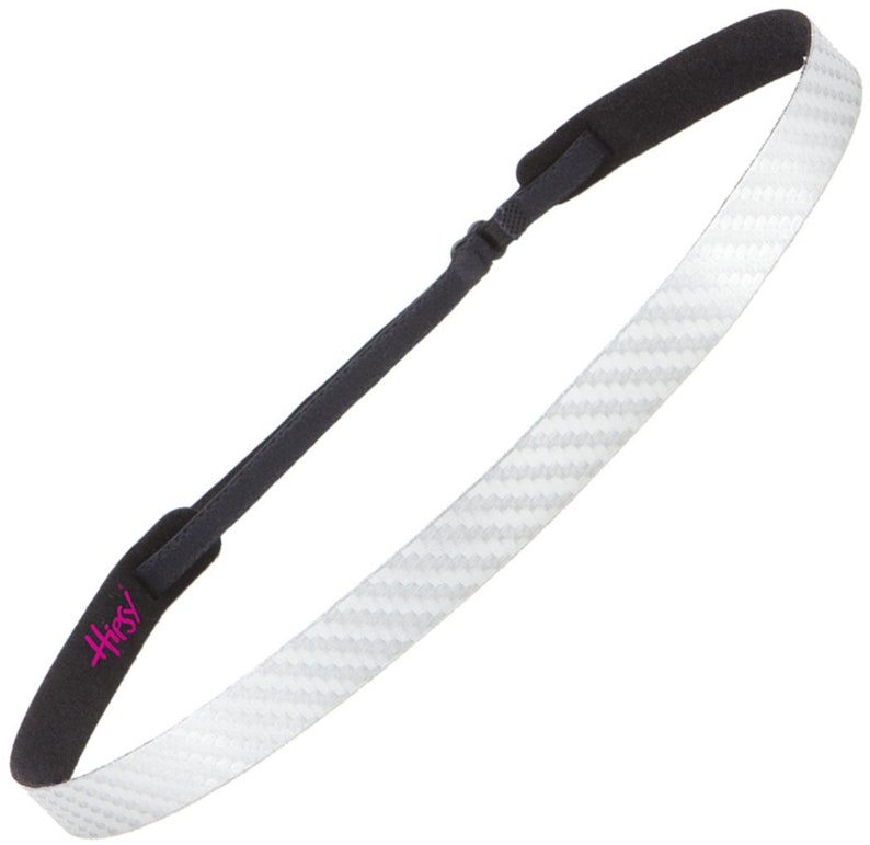 May include: A black and white patterned headband with a black elastic band and the word "Hissy" printed in pink on the band.