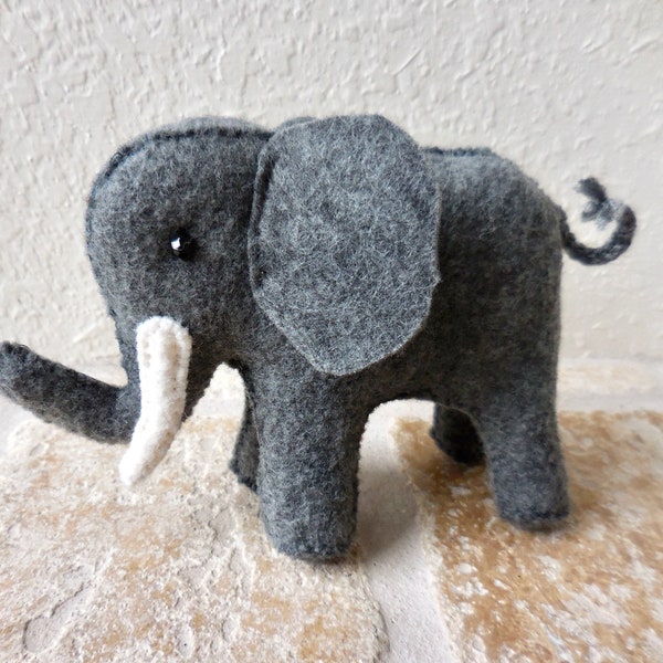 Dark gray felt elephant with tusks, handmade elephant soft toy, endangered species soft sculpture, stuffed felt animal